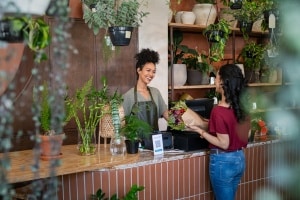 local business owner interacting with customer